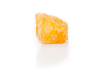 Ruwe edelsteen met de codering: Levensvreugde - Oranje Calciet